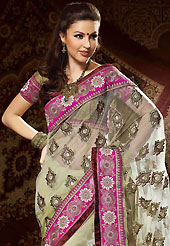 The fascinating beautiful subtly garment with lovely patterns. This pink net saree have beautiful embroidery patch work which is embellished with resham, zari, sequins, stone and kundan work. Fabulous designed embroidery gives you an ethnic look and increasing your beauty. Matching blouse is available. Slight Color variations are possible due to differing screen and photograph resolutions.