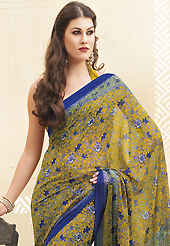 The most beautiful refinements for style and tradition. This olive green and blue faux georgette saree is nicely designed with floral print work. Saree gives you a singular and dissimilar look. Matching blouse is available. Slight color variations are possible due to differing screen and photograph resolution.