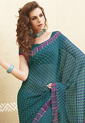 Era with extension in fashion, style, Grace and elegance have developed grand love affair with this ethnical wear. This teal green and blue faux georgette saree is nicely designed with floral print work. Saree gives you a singular and dissimilar look. Matching blouse is available. Slight color variations are possible due to differing screen and photograph resolution.