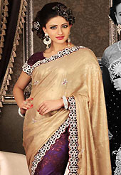 Embroidered sarees are the best choice for a girl to enhance her feminine look. This light fawn and dark purple shimmer and faux georgette saree have beautiful embroidery and velvet patch work which is embellished with stone, applique and cutbeads work. Fabulous designed embroidery gives you an ethnic look and increasing your beauty. Matching blouse is available. Slight Color variations are possible due to differing screen and photograph resolutions.