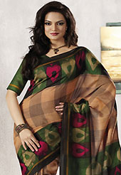 Era with extension in fashion, style, Grace and elegance have developed grand love affair with this ethnical wear. This beautiful light brown, green and black art silk saree is nicely designed with geometric and abstract print work. Beautiful print work on saree make attractive to impress all. It will enhance your personality and gives you a singular look. Matching blouse is available with this saree. Slight color variations are due to differing screen and photography resolution.