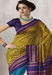 Get ready to sizzle all around you by sparkling saree. This beautiful light olive green and blue art silk saree is nicely designed with abstract, paisley and geometric print work. Beautiful print work on saree make attractive to impress all. It will enhance your personality and gives you a singular look. Matching violet blouse is available with this saree. Slight color variations are due to differing screen and photography resolution.