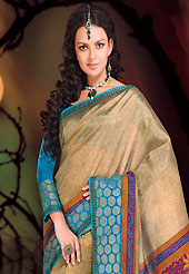 Ultimate collection of embroidered sarees with fabulous style. This beautiful beige and blue art silk saree is nicely designed with floral, paisley and dot print work. Beautiful print work on saree make attractive to impress all. It will enhance your personality and gives you a singular look. Matching blue blouse is available with this saree. Slight color variations are due to differing screen and photography resolution.