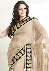 Take the fashion industry by storm in this beautiful embroidered saree. This dark peach georgette saree is nicely designed with embroidered patch work is done with resham, zari, sequins and lace work. Saree gives you a singular and dissimilar look. Matching blouse is available. Slight color variations are possible due to differing screen and photograph resolution.