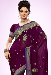 Let your personality articulate for you with this amazing embroidered saree. This burgundy georgette saree is nicely designed with embroidered patch work is done with resham and sequins work. Saree gives you a singular and dissimilar look. Matching blouse is available. Slight color variations are possible due to differing screen and photograph resolution.