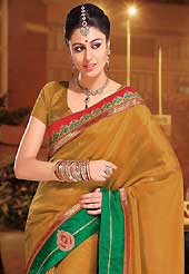 Envelope yourself in classic look with this charming saree. This dusty olive green art silk saree is nicely designed with embroidered patch work is done with resham thread work. Saree gives you a singular and dissimilar look. Matching blouse is available. Slight color variations are possible due to differing screen and photograph resolution.
