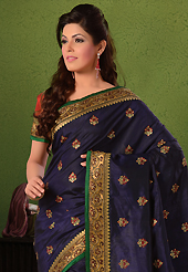 Try out this year top trend, glowing, bold and natural collection. This navy blue dupion silk saree have beautiful embroidery and brocade patch bordered work which is embellished with resham, kasab, cutdana and stone work. Fabulous designed embroidery gives you an ethnic look and increasing your beauty. Contrasting dark salmon blouse is available. Slight Color variations are possible due to differing screen and photograph resolutions.