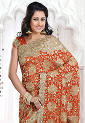 The most beautiful refinements for style and tradition. This dark rust crepe silk saree is nicely designed with embroidered patch work is done with resham, zari, sequins and cutdana work. Saree gives you a singular and dissimilar look. Matching blouse is available. Slight color variations are possible due to differing screen and photograph resolution.