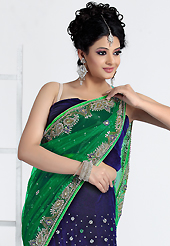 Ultimate collection of embroidered sarees with fabulous style. This green and navy blue net and velvet lehenga style saree have beautiful embroidery patch work which is embellished with stone and cutdana work. Fabulous designed embroidery gives you an ethnic look and increasing your beauty. Matching blouse is available. Slight Color variations are possible due to differing screen and photograph resolutions.