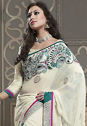 Exquisite combination of color, fabric can be seen here. This off white faux georgette saree have beautiful embroidery patch work which is embellished with resham, zari, stone and beads work. Fabulous designed embroidery gives you an ethnic look and increasing your beauty. Matching blouse is available. Slight Color variations are possible due to differing screen and photograph resolutions.