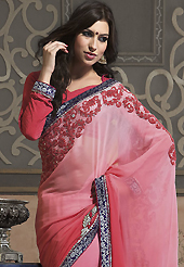 The fascinating beautiful subtly garment with lovely patterns. This shaded pink faux georgette saree have beautiful embroidery patch work which is embellished with resham, zari, stone and beads work. Fabulous designed embroidery gives you an ethnic look and increasing your beauty. Matching blouse is available. Slight Color variations are possible due to differing screen and photograph resolutions.
