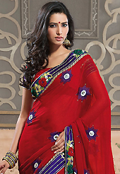 The traditional patterns used on this saree maintain the ethnic look. This red faux georgette saree have beautiful embroidery patch work which is embellished with resham, zari, stone, beads and lace work. Fabulous designed embroidery gives you an ethnic look and increasing your beauty. Matching blouse is available. Slight Color variations are possible due to differing screen and photograph resolutions.