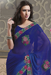 The most beautiful refinements for style and tradition. This blue faux georgette saree have beautiful embroidery patch work which is embellished with resham, stone and beads work. Fabulous designed embroidery gives you an ethnic look and increasing your beauty. Matching blouse is available. Slight Color variations are possible due to differing screen and photograph resolutions.