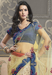 Your search for elegant look ends here with this lovely saree. This light yellow, fawn and blue net and viscose lehenga style saree have beautiful embroidery patch work which is embellished with resham, zari and lace work. Fabulous designed embroidery gives you an ethnic look and increasing your beauty. Matching dark blue blouse is available. Slight Color variations are possible due to differing screen and photograph resolutions.