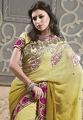 A desire that evokes a sense of belonging with a striking details. This shaded dark yellow faux georgette saree have beautiful embroidery patch work which is embellished with resham, zari and stone work. Fabulous designed embroidery gives you an ethnic look and increasing your beauty. Matching blouse is available. Slight Color variations are possible due to differing screen and photograph resolutions.