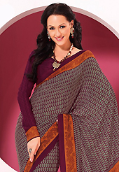 Outfit is a novel ways of getting yourself noticed. This beautiful burgundy and grey faux crepe saree is nicely designed with floral and abstract print work. Beautiful print work on saree make attractive to impress all. It will enhance your personality and gives you a singular look. Matching blouse is available with this saree. Slight color variations are due to differing screen and photography resolution.