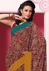 Attract all attentions with this printed saree. This beautiful maroon faux crepe saree is nicely designed with abstract print work. Beautiful print work on saree make attractive to impress all. It will enhance your personality and gives you a singular look. Matching blouse is available with this saree. Slight color variations are due to differing screen and photography resolution.