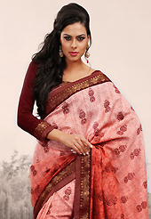 Dreamy variation on shape and forms compliment your style with tradition. This shaded rust saree is nicely designed with abstract print and embroidered patch work is done with resham and zari work. Saree gives you a singular and dissimilar look. Matching blouse is available. Slight color variations are possible due to differing screen and photograph resolution.