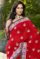 The evolution of style species collection spells pure femininity. This maroon viscose saree is nicely designed with embroidered patch work is done with resham, zari, sequins and stone work. Saree gives you a singular and dissimilar look. Contrasting purple blouse is available. Slight color variations are possible due to differing screen and photograph resolution.