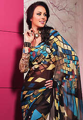 Exquisite combination of color, fabric can be seen here. This beautiful deep brown and blue faux georgette saree is nicely designed with geometric print work. Beautiful print work on saree make attractive to impress all. It will enhance your personality and gives you a singular look. Matching blouse is available with this saree. Slight color variations are due to differing screen and photography resolution.