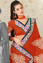 Take the fashion industry by storm in this beautiful embroidered saree. This dark rust chiffon jacquard saree is nicely designed with embroidered patch work is done with resham, zari, sequins and stone work. Saree gives you a singular and dissimilar look. Matching blouse is available. Slight color variations are possible due to differing screen and photograph resolution.