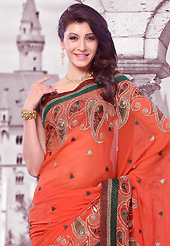 An casual wear perfect is ready to rock you. This deep orange georgette saree is nicely designed with embroidered patch work is done with resham, zari, sequins and lace work. Saree gives you a singular and dissimilar look. Matching blouse is available. Slight color variations are possible due to differing screen and photograph resolution.
