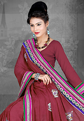 Exquisite combination of color, fabric can be seen here. This light maroon crepe silk saree is nicely designed with embroidered patch work is done with resham, zari, stone and lace work. Saree gives you a singular and dissimilar look. Matching blouse is available. Slight color variations are possible due to differing screen and photograph resolution.