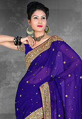 Elegance and innovation of designs crafted for you. This blue chiffon saree is nicely designed with embroidered patch work is done with resham, zari and stone work. Saree gives you a singular and dissimilar look. Matching blouse is available. Slight color variations are possible due to differing screen and photograph resolution.