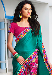 The glamorous silhouette to meet your most dire fashion needs. This teal green and dark pink jacquard and chiffon saree is nicely designed with flower print and embroidered patch work is done with zari, sequins and lace work. Beautiful embroidery work on saree make attractive to impress all. Matching blouse is available. Slight color variations are possible due to differing screen and photograph resolution.