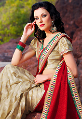 Welcome to the new era of Indian fashion wear. This red and beige jacquard and viscose georgette saree is nicely designed with embroidered patch work is done with resham, zari and lace work. Beautiful embroidery work on saree make attractive to impress all. Matching blouse is available. Slight color variations are possible due to differing screen and photograph resolution.