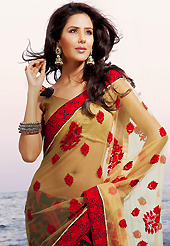 Let your personality articulate for you with this amazing embroidered saree. This fawn and black net and brosso saree is nicely designed with embroidered patch work is done with resham, zari and stone work. Beautiful embroidery work on saree make attractive to impress all. Matching blouse is available. Slight color variations are possible due to differing screen and photograph resolution.