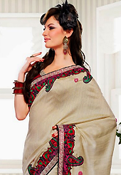 Try out this year top trend, glowing, bold and natural collection. This light fawn bhagalpuri silk saree have beautiful embroidery patch work which is embellished with resham work. Fabulous designed embroidery gives you an ethnic look and increasing your beauty. Contrasting maroon blouse is available. Slight Color variations are possible due to differing screen and photograph resolutions.