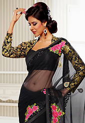 Style and trend will be at the peak of your beauty when you adorn this saree. This black net saree have beautiful embroidery patch work which is embellished with resham, zari and sequins work. Fabulous designed embroidery gives you an ethnic look and increasing your beauty. Matching blouse is available. Slight Color variations are possible due to differing screen and photograph resolutions.