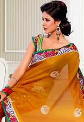 Take a look on the changing fashion of the season. This orange and red georgette and viscose saree have beautiful embroidery patch work which is embellished with resham, zari and sequins work. Fabulous designed embroidery gives you an ethnic look and increasing your beauty. Matching blouse is available. Slight Color variations are possible due to differing screen and photograph resolutions.