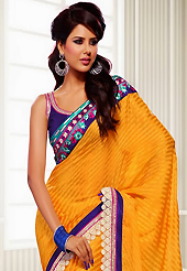 The traditional patterns used on this saree maintain the ethnic look. This dark yellow crepe jacquard saree have beautiful embroidery patch work which is embellished with resham, zari and lace work. Fabulous designed embroidery gives you an ethnic look and increasing your beauty. Contrasting purple blouse is available. Slight Color variations are possible due to differing screen and photograph resolutions.