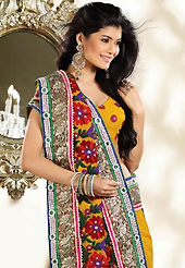 Ultimate collection of embroidery sarees with fabulous style. This dark yellow georgette saree is nicely designed with embroidery patch work is done with resham, zari and stone work. Beautiful embroidery work on saree make attractive to impress all. This saree gives you a modern and different look in fabulous style. Matching blouse is available. Slight color variations are possible due to differing screen and photograph resolution.