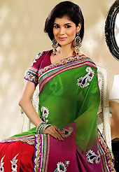 A desire that evokes a sense of belonging with a striking details. This green and red georgette saree is nicely designed with embroidery patch work is done with resham, zari, stone and lace work. Beautiful embroidery work on saree make attractive to impress all. This saree gives you a modern and different look in fabulous style. Matching blouse is available. Slight color variations are possible due to differing screen and photograph resolution.