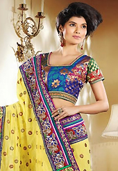 Take a look on the changing fashion of the season. This yellow georgette saree is nicely designed with embroidery patch work is done with resham, zari, stone and lace work. Beautiful embroidery work on saree make attractive to impress all. This saree gives you a modern and different look in fabulous style. Contrasting blue viscose blouse is available. Slight color variations are possible due to differing screen and photograph resolution.
