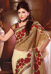 It is color this season and bright shaded suits are really something that is totally in vogue. This light fawn net saree have beautiful embroidery patch work which is embellished with resham, zari, stone, beads and lace work. Fabulous designed embroidery gives you an ethnic look and increasing your beauty. Matching blouse is available. Slight Color variations are possible due to differing screen and photograph resolutions.