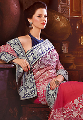 Dreamy variation on shape and forms compliment your style with tradition. This dark pink net saree have beautiful embroidery patch work which is embellished with resham work. Fabulous designed embroidery gives you an ethnic look and increasing your beauty. Contrasting navy blue velvet blouse is available. Slight Color variations are possible due to differing screen and photograph resolutions.