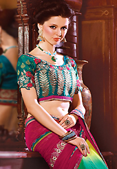 The fascinating beautiful subtly garment with lovely patterns. This dark pink, green and dark blue faux georgette saree have beautiful embroidery patch work which is embellished with resham, sequins and stone work. Fabulous designed embroidery gives you an ethnic look and increasing your beauty. Contrasting turquoise green blouse is available. Slight Color variations are possible due to differing screen and photograph resolutions.