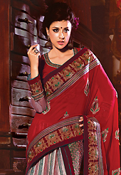 Style and trend will be at the peak of your beauty when you adorn this saree. This red and off white bemberg georgette and net saree have beautiful embroidery patch work which is embellished with resham, zari, sequins and lace work. Fabulous designed embroidery gives you an ethnic look and increasing your beauty. Matching blouse is available. Slight Color variations are possible due to differing screen and photograph resolutions.