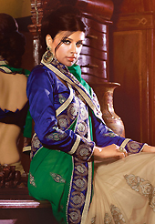 Dreamy variation on shape and forms compliment your style with tradition. This green and fawn faux chiffon and net saree have beautiful embroidery patch work which is embellished with resham, zari, sequins, stone and lace work. Fabulous designed embroidery gives you an ethnic look and increasing your beauty. Contrasting dark blue blouse is available. Slight Color variations are possible due to differing screen and photograph resolutions.