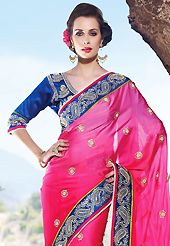 Style and trend will be at the peak of your beauty when you adorn this saree. This shaded pink faux satin georgette saree have beautiful embroidery patch work which is embellished with resham, zari, stone, beads and lace work. Fabulous designed embroidery gives you an ethnic look and increasing your beauty. Contrasting blue art silk blouse is available. Slight Color variations are possible due to differing screen and photograph resolutions.