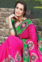 The fascinating beautiful subtly garment with lovely patterns. This dark pink faux crepe jacquard saree have beautiful embroidery patch work which is embellished with resham, zari, stone, beads and lace work. Fabulous designed embroidery gives you an ethnic look and increasing your beauty. Contrasting green art silk blouse is available. Slight Color variations are possible due to differing screen and photograph resolutions.