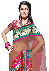 Style and trend will be at the peak of your beauty when you adorn this saree. This light brown net saree have beautiful embroidery patch work which is embellished with resham, zari and stone work. Fabulous designed embroidery gives you an ethnic look and increasing your beauty. Contrasting pink brocade blouse is available. Slight Color variations are possible due to differing screen and photograph resolutions.