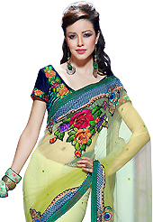 An occasion wear perfect is ready to rock you. This shaded light green net saree have beautiful embroidery patch work which is embellished with resham, zari, stone, applique and beads work. Fabulous designed embroidery gives you an ethnic look and increasing your beauty. Contrasting navy blue velvet blouse is available. Slight Color variations are possible due to differing screen and photograph resolutions.