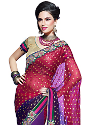 The glamorous silhouette to meet your most dire fashion needs. This deep pink and purple faux chiffon and net saree have beautiful embroidery patch work which is embellished with resham, zari and stone work. Fabulous designed embroidery gives you an ethnic look and increasing your beauty. Contrasting cream shimmer art silk blouse is available. Slight Color variations are possible due to differing screen and photograph resolutions.