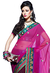 It is color this season and bright shaded suits are really something that is totally in vogue. This dark pink and black faux georgette saree have beautiful stripe print and embroidery patch work which is embellished with resham, zari, stone, cutbeads and lace work. Fabulous designed embroidery gives you an ethnic look and increasing your beauty. Matching black blouse is available. Slight Color variations are possible due to differing screen and photograph resolutions.