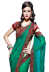 Exquisite combination of color, fabric can be seen here. This green faux chiffon and net lehenga style saree have beautiful embroidery patch work which is embellished with resham, zari, stone, beads and lace work. Fabulous designed embroidery gives you an ethnic look and increasing your beauty. Contrasting maroon blouse is available. Slight Color variations are possible due to differing screen and photograph resolutions.